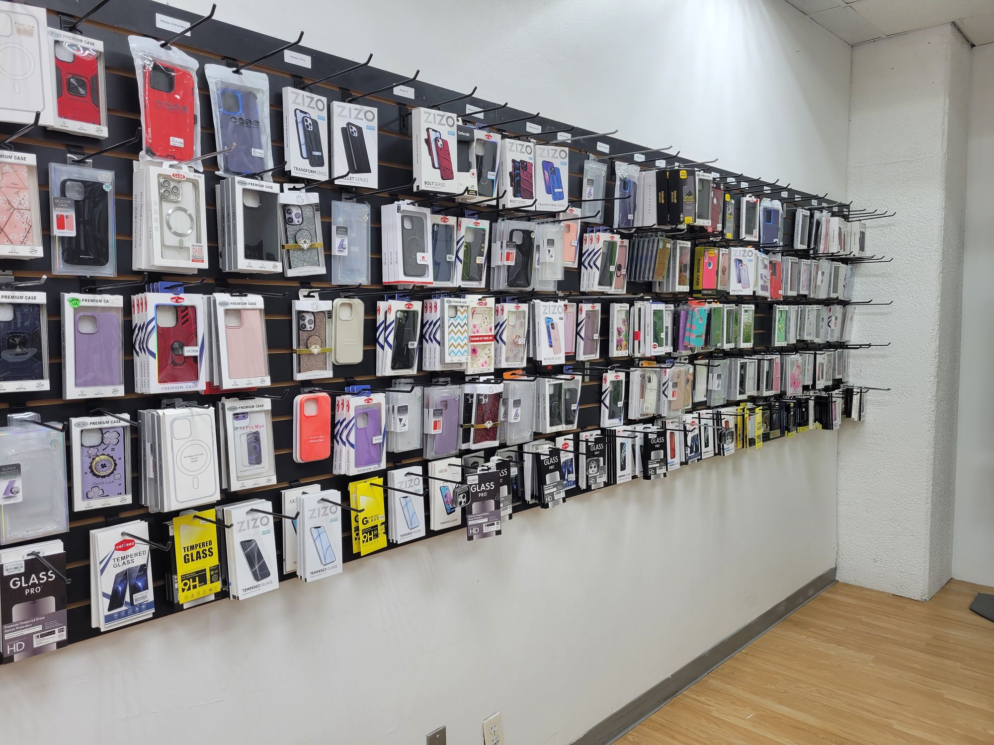 Wall of phone cases and screen protectors
