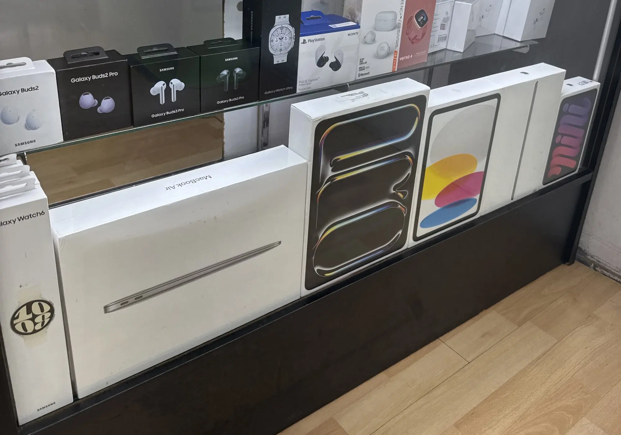 MacBook Air, iPad Pro, iPad and iPad mini on display at TIC Wireless in Houston
