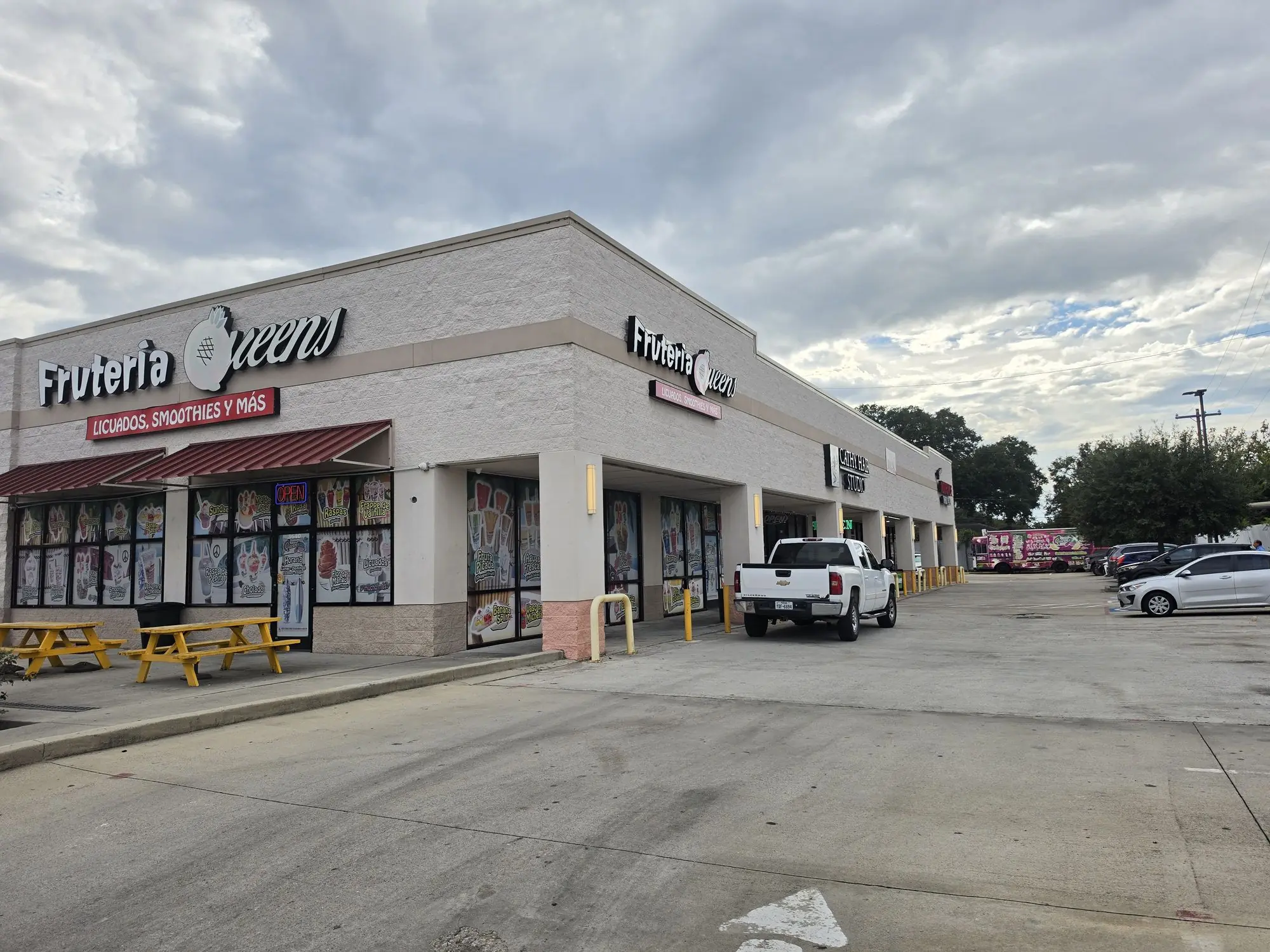 The shopping center at 3640 Hillcroft St, Suite C from the parking lot